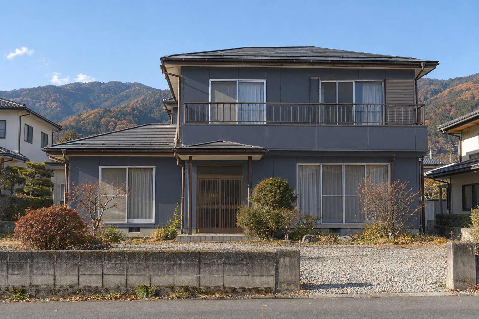 塗り替え後の外壁のイメージ。濃いネイビーグレーに塗り替えた二階建ての家（下諏訪町の住宅を想定・AIで作成）